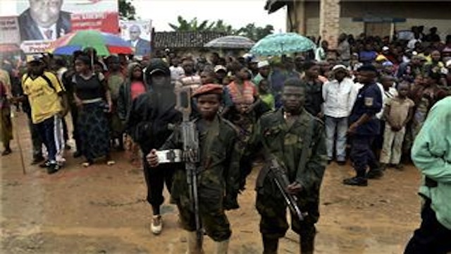 Rwandan government backed Congolese Mai-Mai Cheka armed group in a village in Walikale, DRC 